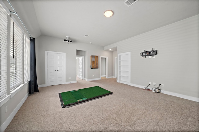 4411 Windy Oaks Dr, Fulshear, TX 77441 - unfurnished bedroom featuring light colored carpet, lofted ceiling, baseboards, and a closet