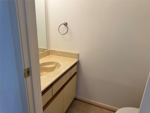 9850 Pagewood Ln Unit 1001, Houston, TX 77042 - half bath with vanity, tile patterned flooring, and baseboards