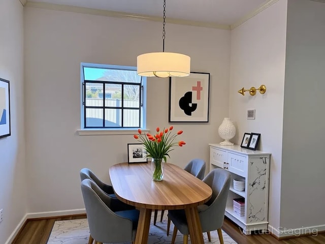 9850 Pagewood Ln Unit 1001, Houston, TX 77042 - dining space with dark wood-type flooring, baseboards, and ornamental molding