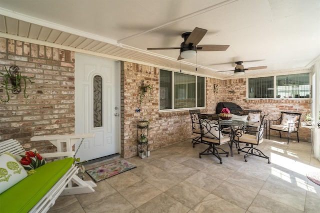 view of patio featuring a ceiling fan and outdoor dining space