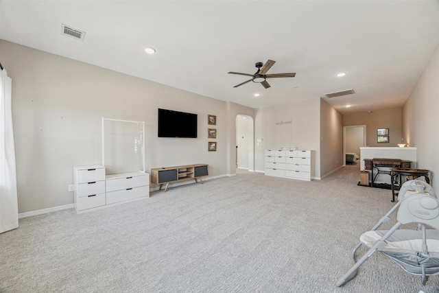 17934 Wichita River Way, Cypress, TX 77433 - living area featuring light colored carpet, visible vents, and arched walkways