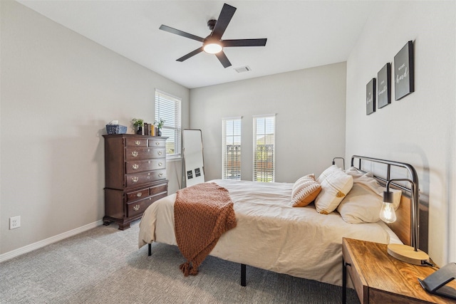 17934 Wichita River Way, Cypress, TX 77433 - bedroom featuring baseboards, a ceiling fan, visible vents, and light colored carpet