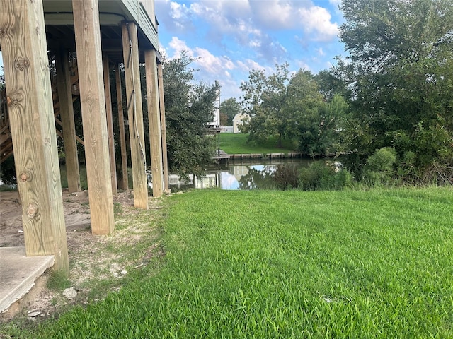205 Rue Orleans St, Baytown, TX 77520 - view of yard featuring a water view