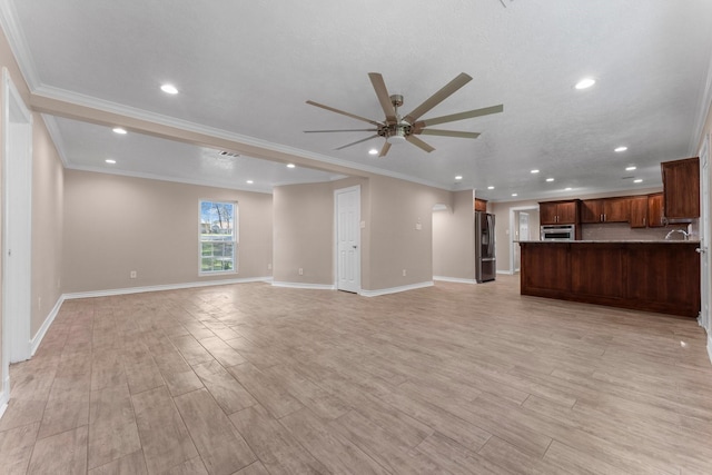 unfurnished living room featuring baseboards, ceiling fan, recessed lighting, and light wood finished floors