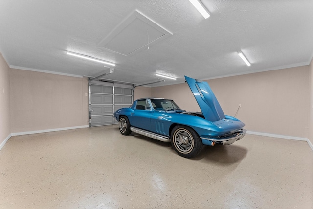 garage with baseboards