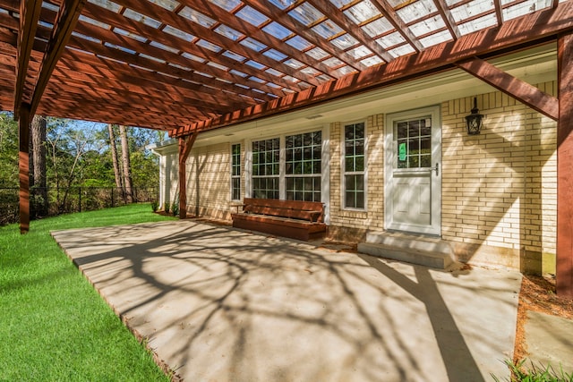 view of patio / terrace featuring entry steps, fence, and a pergola