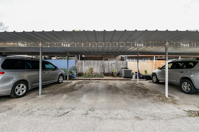 7885 Cook Rd, Houston, TX 77072 - covered parking lot featuring fence