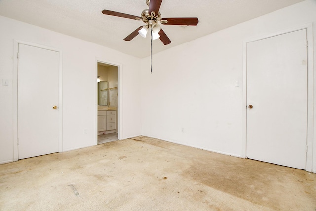 7885 Cook Rd, Houston, TX 77072 - unfurnished bedroom featuring ensuite bathroom, ceiling fan, and carpet