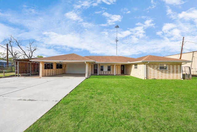 ranch-style house with driveway, a front yard, an attached garage, brick siding, and a carport
