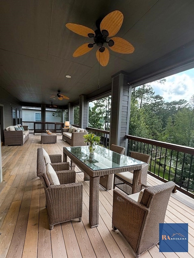 270 Lake Grove Dr, Coldspring, TX 77331 - deck featuring an outdoor hangout area, ceiling fan, and outdoor dining space