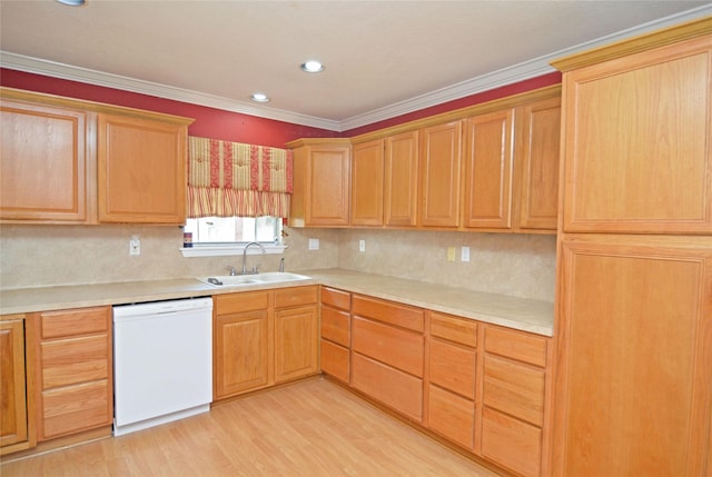 2719 Sweetgum St, Pasadena, TX 77502 - kitchen with dishwasher, a sink, light wood finished floors, light countertops, and backsplash