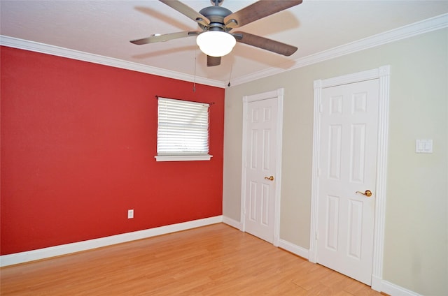 2719 Sweetgum St, Pasadena, TX 77502 - unfurnished bedroom featuring wood finished floors, baseboards, ornamental molding, and a ceiling fan