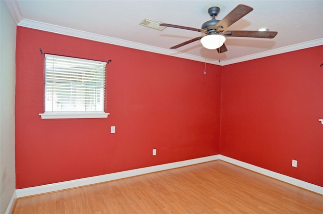 2719 Sweetgum St, Pasadena, TX 77502 - spare room with baseboards, wood finished floors, ornamental molding, and a ceiling fan