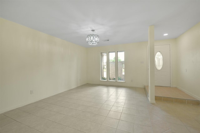 foyer with baseboards, visible vents, an inviting chandelier, recessed lighting, and light tile patterned floors