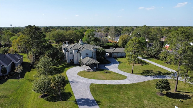 1204 Cowards Creek Dr, Friendswood, TX 77546 - bird's eye view featuring a wooded view