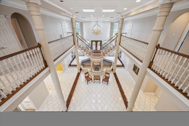 1204 Cowards Creek Dr, Friendswood, TX 77546 - interior space with crown molding, tile patterned flooring, recessed lighting, and ornate columns