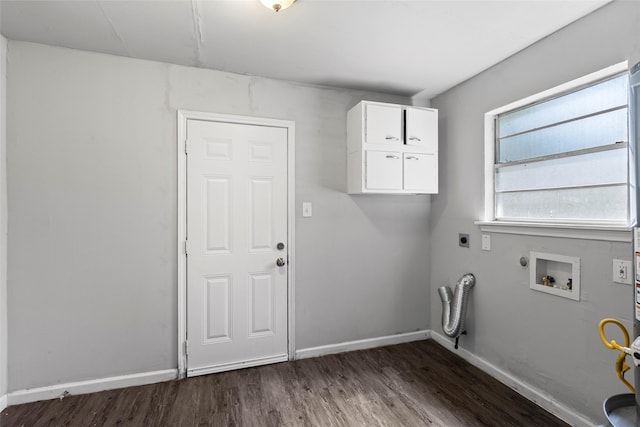12109 22nd St, Santa Fe, TX 77510 - washroom with cabinet space, electric dryer hookup, dark wood-type flooring, and hookup for a washing machine