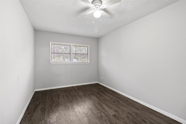 12109 22nd St, Santa Fe, TX 77510 - unfurnished room with dark wood finished floors, ceiling fan, and a textured ceiling