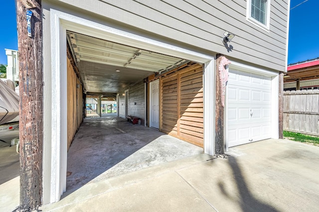 garage featuring driveway