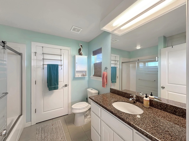 full bath with tile patterned floors, visible vents, toilet, and vanity