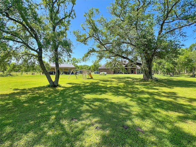 view of yard featuring a playground
