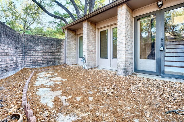 5860 Sampley Way Unit 5860, Houston, TX 77092 - exterior space with fence and brick siding