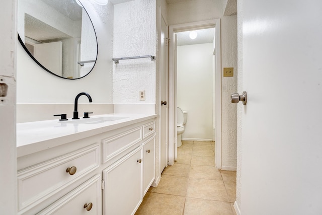 5860 Sampley Way Unit 5860, Houston, TX 77092 - bathroom featuring toilet, vanity, and tile patterned floors