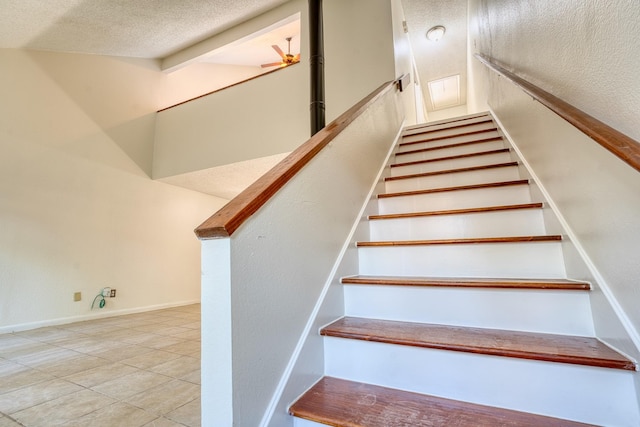 5860 Sampley Way Unit 5860, Houston, TX 77092 - stairway with baseboards, tile patterned flooring, and a textured ceiling