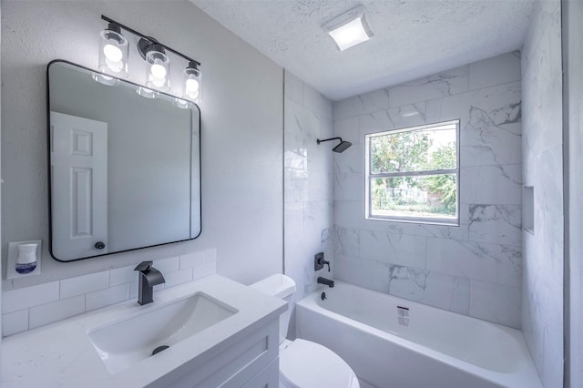 bathroom featuring vanity, a textured ceiling, toilet, decorative backsplash, and washtub / shower combination