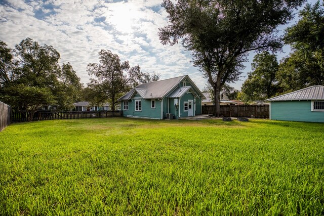 607 Center St, Brenham, TX 77833 - view of yard with a fenced backyard and cooling unit