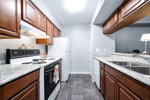 7600 Emmett F Lowry Expy Unit 807, Texas City, TX 77591 - kitchen with white appliances, under cabinet range hood, a sink, and light countertops