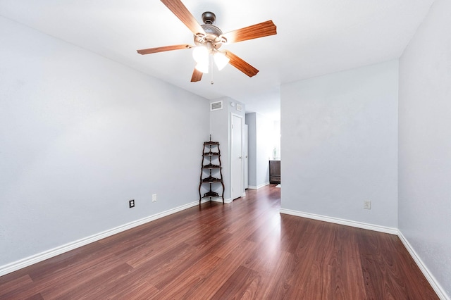 7600 Emmett F Lowry Expy Unit 807, Texas City, TX 77591 - empty room featuring ceiling fan, dark wood-type flooring, and baseboards