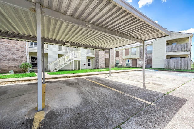 7600 Emmett F Lowry Expy Unit 807, Texas City, TX 77591 - covered parking lot with stairway