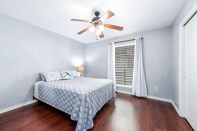 7600 Emmett F Lowry Expy Unit 807, Texas City, TX 77591 - bedroom featuring wood finished floors, baseboards, and ceiling fan