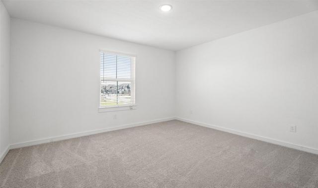 924 Wormwood Dr, League City, TX 77573 - carpeted spare room with baseboards and recessed lighting