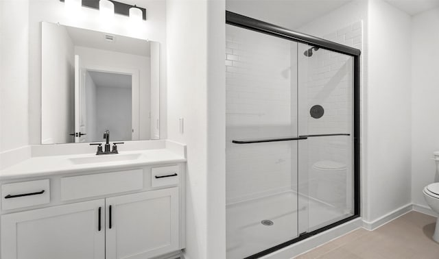 924 Wormwood Dr, League City, TX 77573 - bathroom featuring a shower stall, vanity, and tile patterned flooring