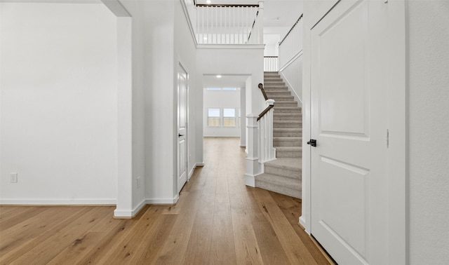 924 Wormwood Dr, League City, TX 77573 - foyer featuring light wood-style floors and stairs