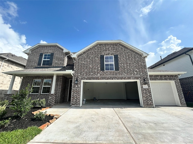 924 Wormwood Dr, League City, TX 77573 - traditional-style house with brick siding, driveway, and a garage