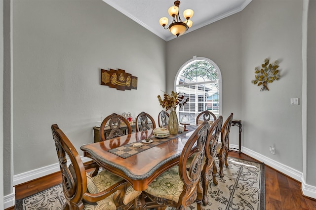 108 Somerton Dr, Montgomery, TX 77356 - dining area with a chandelier, crown molding, wood finished floors, and baseboards