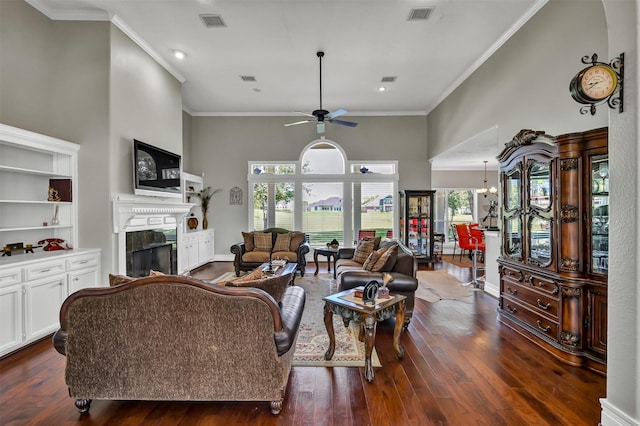 108 Somerton Dr, Montgomery, TX 77356 - living area with a fireplace, a towering ceiling, ceiling fan, dark wood-style floors, and recessed lighting