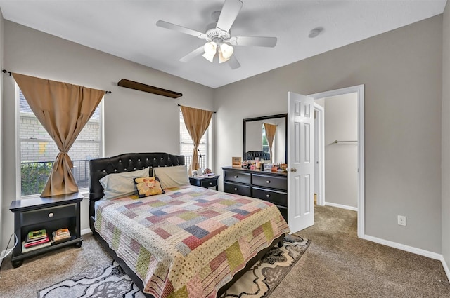 108 Somerton Dr, Montgomery, TX 77356 - bedroom with carpet flooring, multiple windows, baseboards, and a ceiling fan
