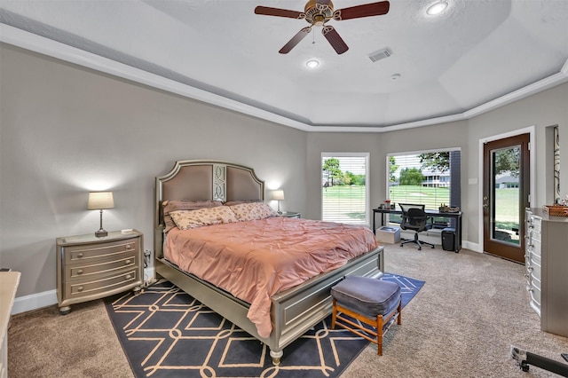 108 Somerton Dr, Montgomery, TX 77356 - carpeted bedroom featuring a raised ceiling, access to exterior, baseboards, a desk, and recessed lighting