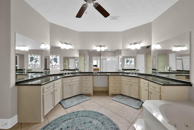 108 Somerton Dr, Montgomery, TX 77356 - full bath featuring ceiling fan, a jetted tub, vanity, tile patterned floors, and a shower
