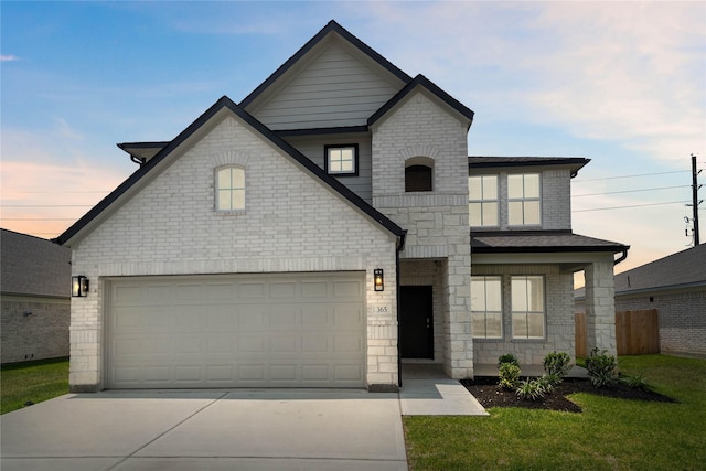 365 Spruce Oak Ln, Waller, TX 77484 - french country style house featuring driveway, stone siding, and brick siding