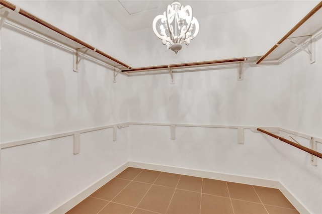 spacious closet with tile patterned floors