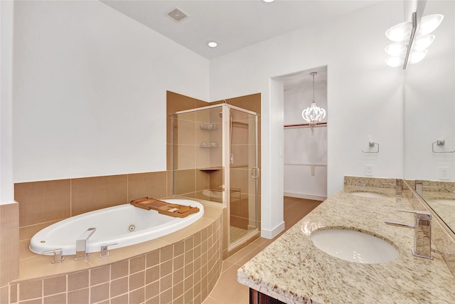 full bath featuring visible vents, a shower stall, double vanity, a sink, and a whirlpool tub