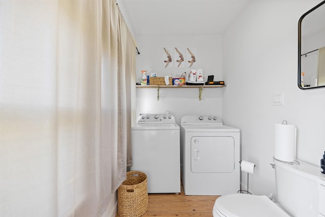 1731 Spur 458, Carmine, TX 78932 - washroom with separate washer and dryer and light wood finished floors