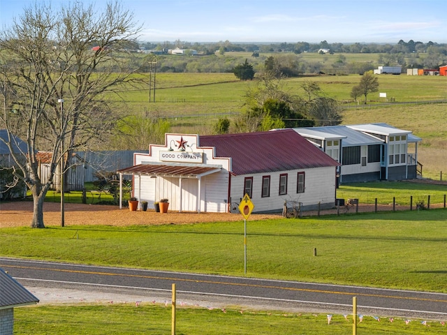 1731 Spur 458, Carmine, TX 78932 - back of property with metal roof and a view of countryside