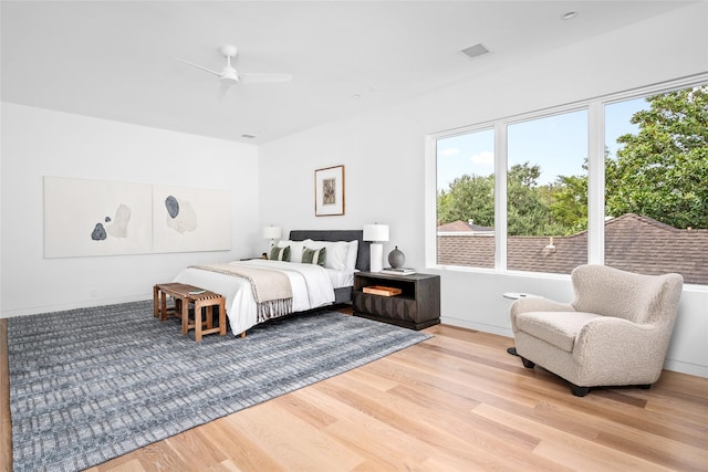 2215 Albans Rd, Houston, TX 77005 - bedroom with wood finished floors and a ceiling fan