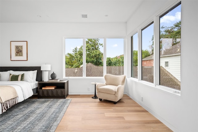2215 Albans Rd, Houston, TX 77005 - bedroom with light wood-style flooring, multiple windows, and baseboards